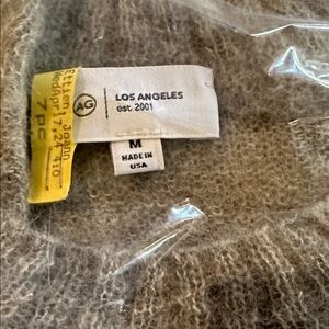 Beautiful merino wool light gray pull over sweater